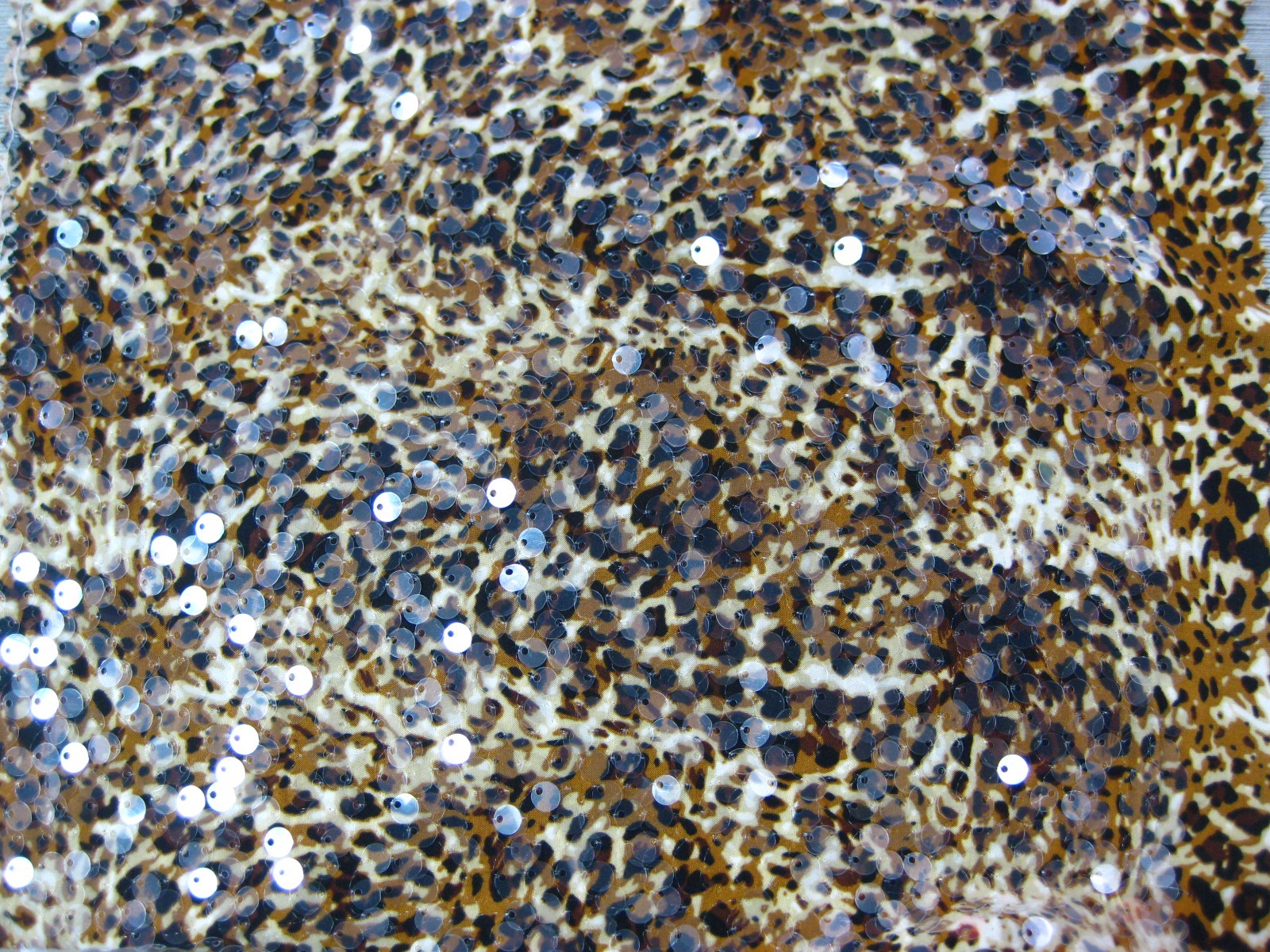 FDY KNINT SPAN PRINT WITH SPANGLE EMB